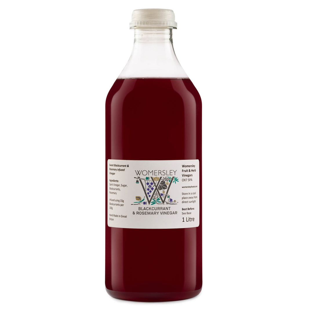 1 litre bottle of Womersley Foods Blackcurrant & Rosemary Fruit Vinegar with white background.
