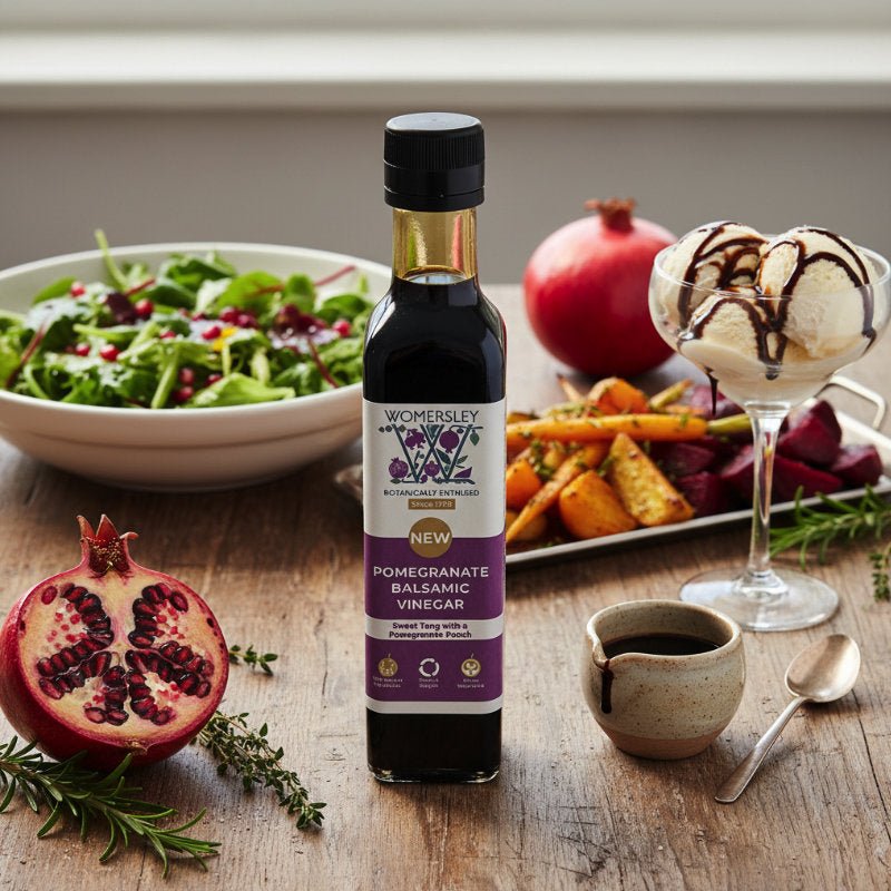 Womersley Pomegranate Balsamic Vinegar 250ml bottle with salad, roasted vegetables, and ice cream drizzle
