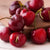 Clsoe up of Cherry Fruits on a cutting board.